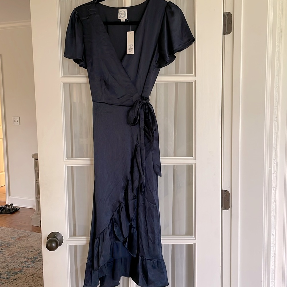 navy with ruffle detail wrap dress. midi length
